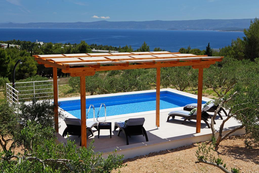 Holiday Homes Oliva Бол Стая снимка