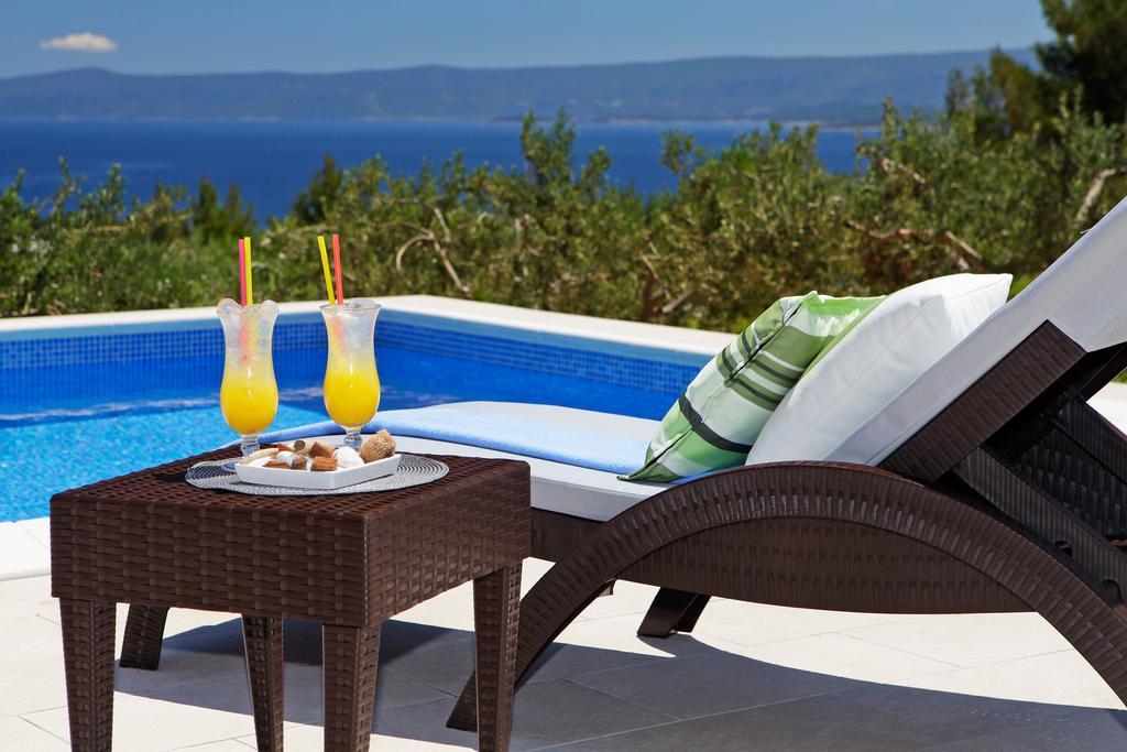 Holiday Homes Oliva Бол Стая снимка
