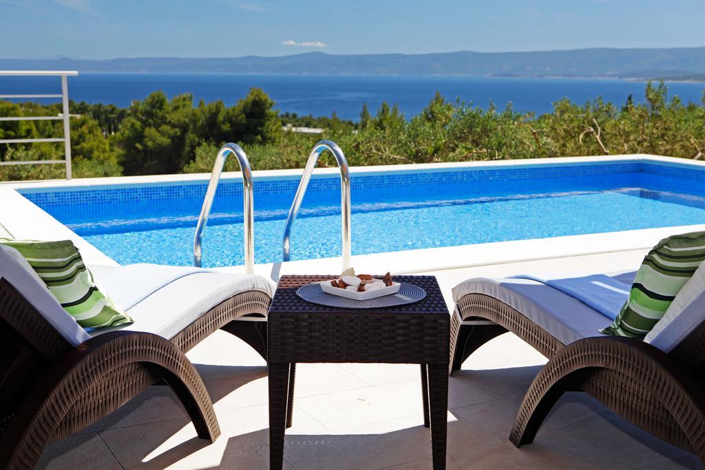Holiday Homes Oliva Бол Стая снимка