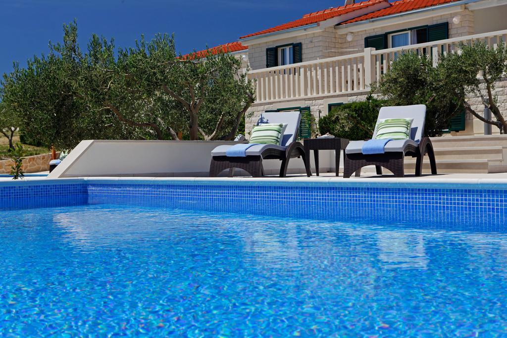 Holiday Homes Oliva Бол Стая снимка