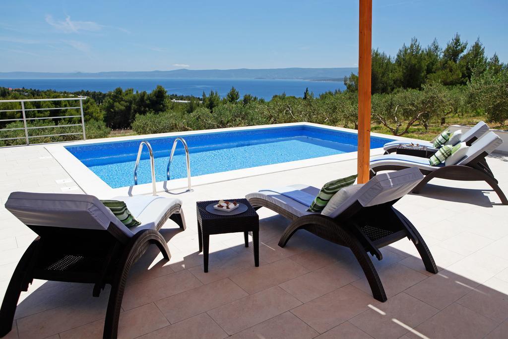 Holiday Homes Oliva Бол Стая снимка