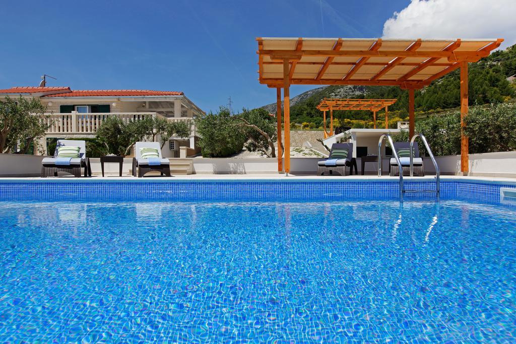 Holiday Homes Oliva Бол Стая снимка