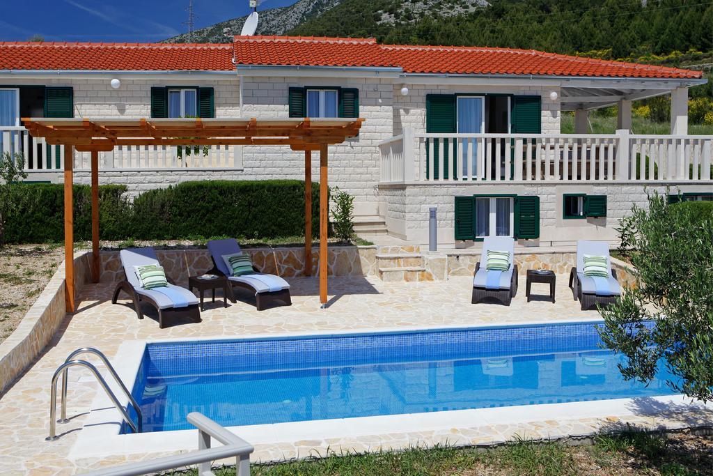 Holiday Homes Oliva Бол Стая снимка