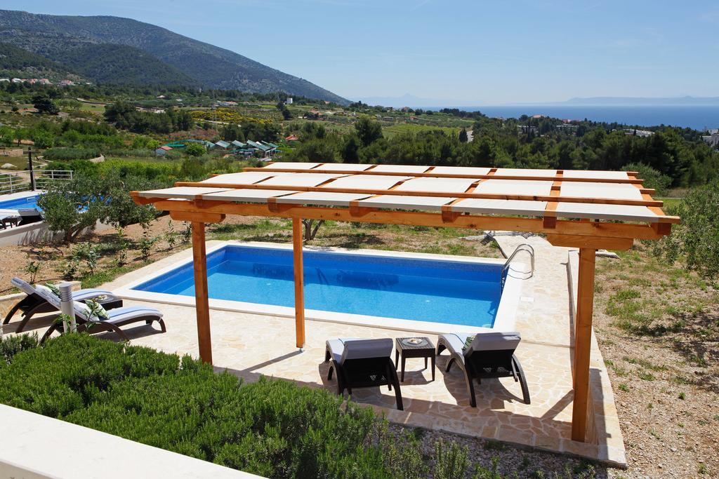 Holiday Homes Oliva Бол Стая снимка