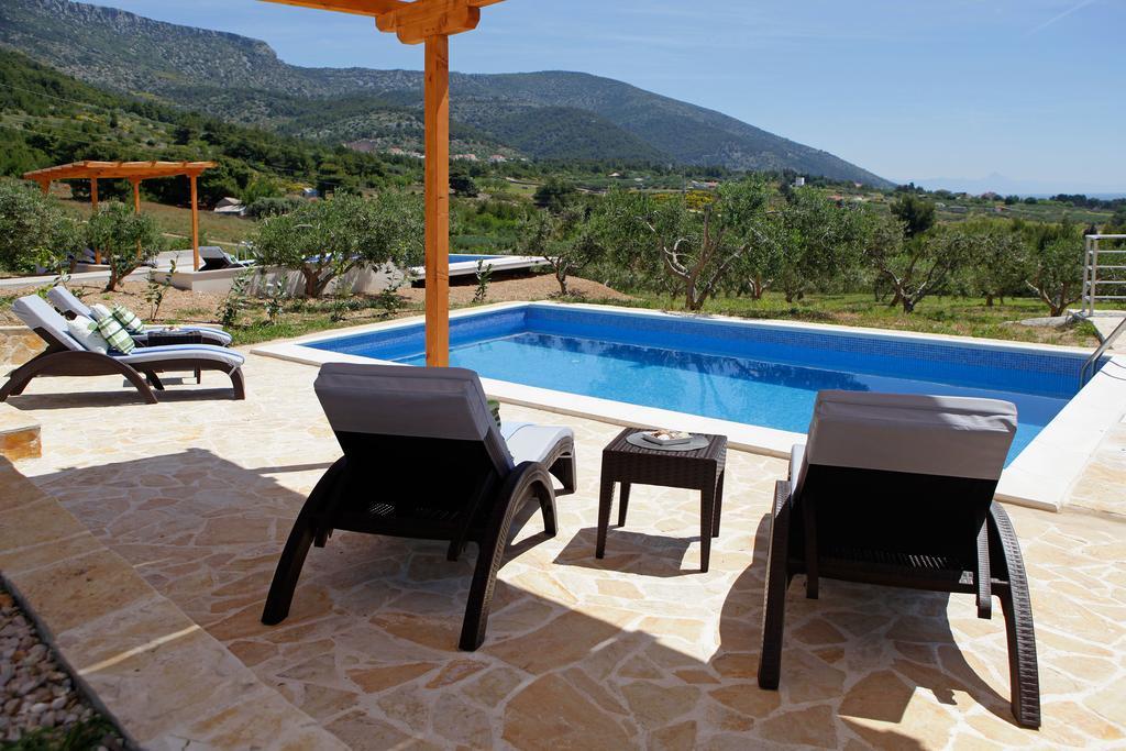 Holiday Homes Oliva Бол Стая снимка